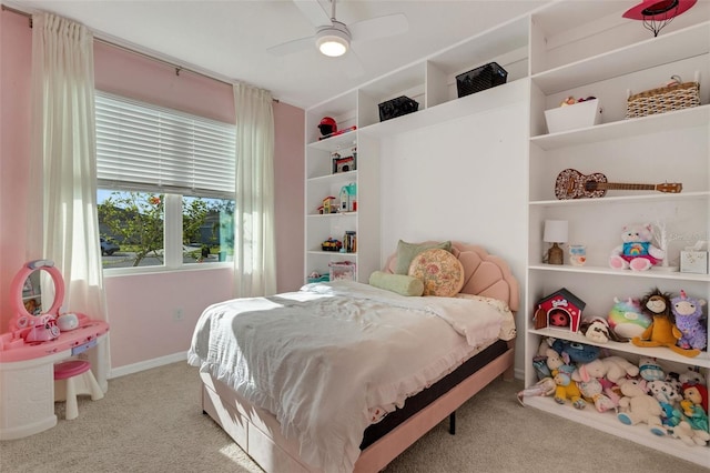 bedroom with ceiling fan and light colored carpet