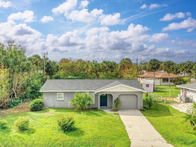 single story home with a garage and a front yard