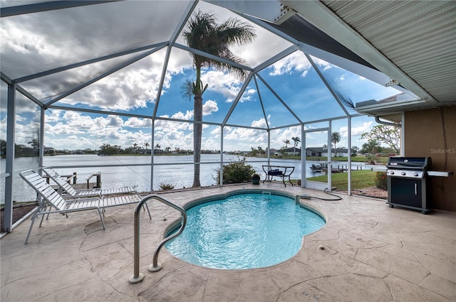 view of swimming pool with a patio, grilling area, a water view, and a lanai