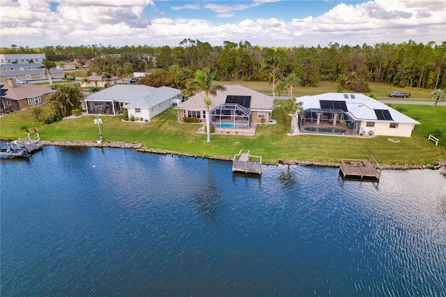 birds eye view of property featuring a water view