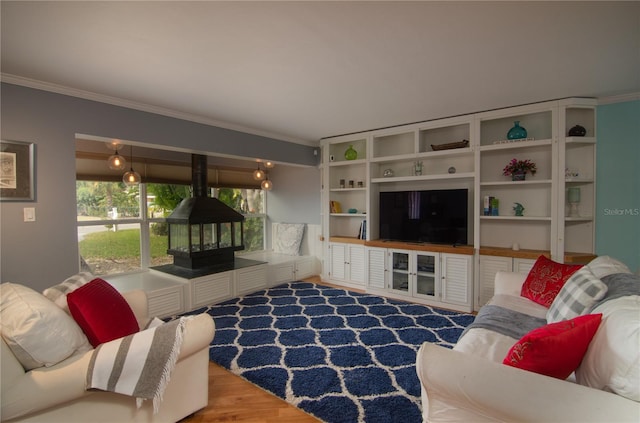 living room featuring hardwood / wood-style floors and ornamental molding