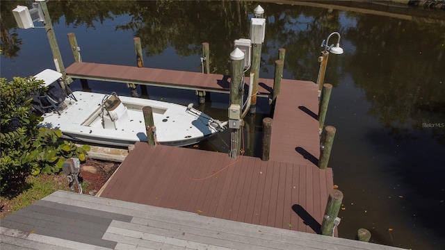 view of dock with a water view