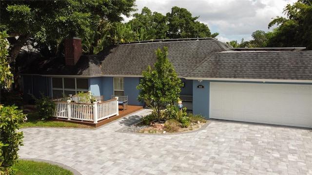 single story home with a garage