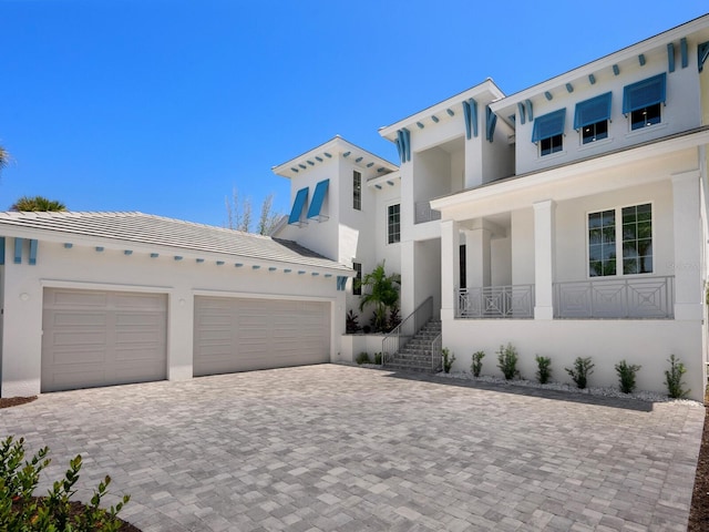 view of front of property featuring a garage