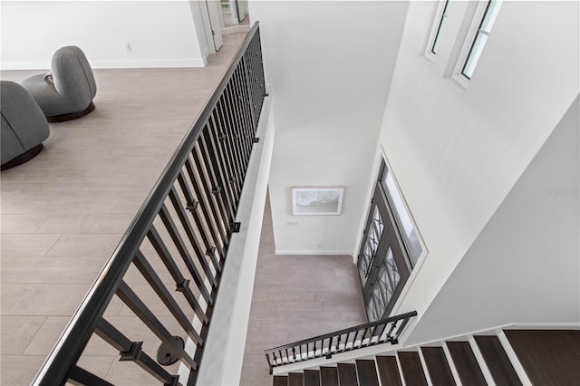 stairway featuring hardwood / wood-style flooring