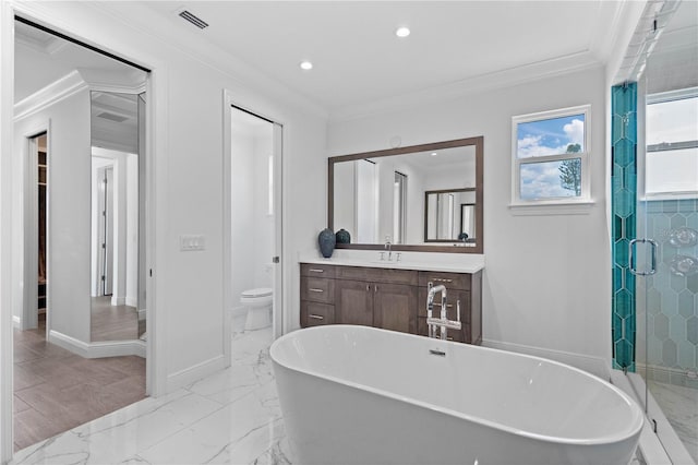 full bathroom featuring independent shower and bath, vanity, toilet, and crown molding