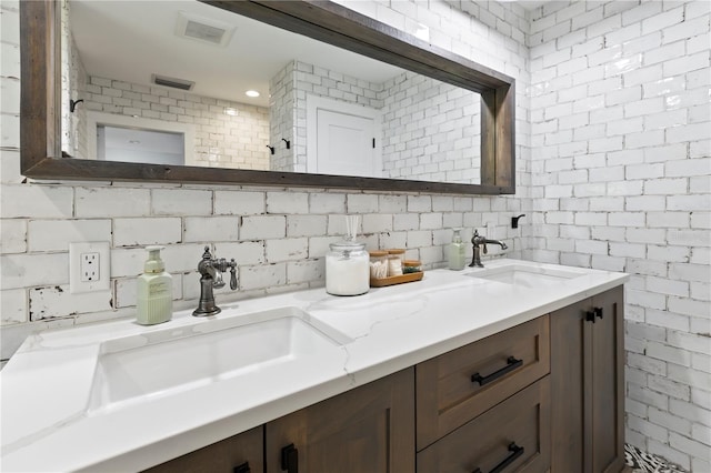 bathroom with backsplash and vanity