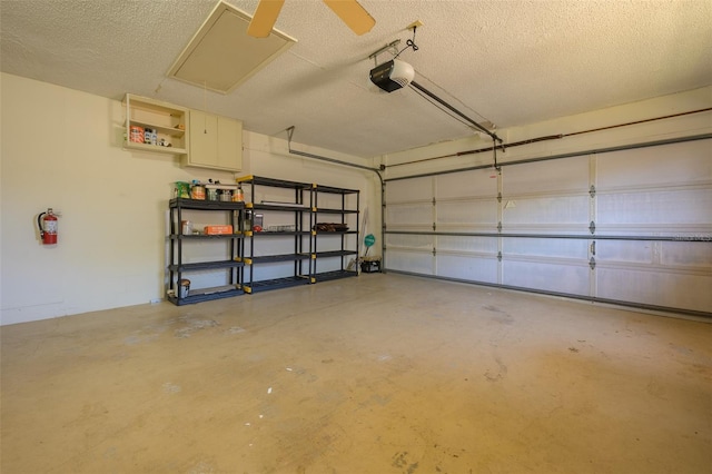 garage featuring ceiling fan and a garage door opener