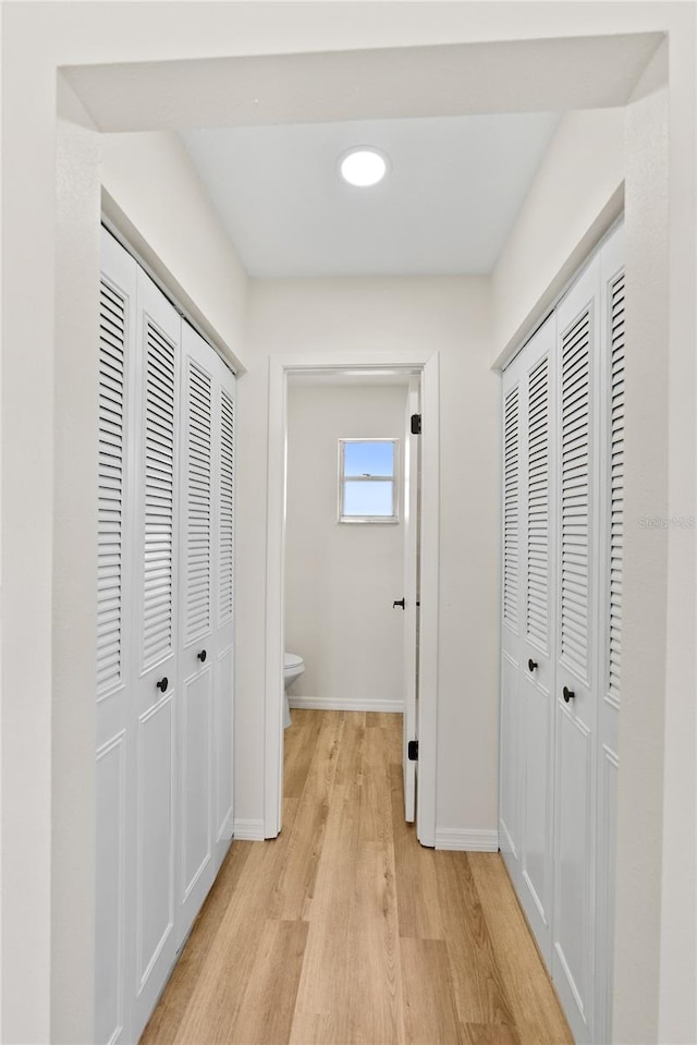 hallway featuring light wood-type flooring