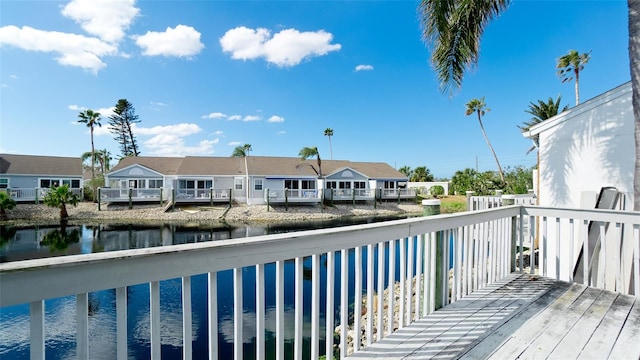 deck featuring a water view