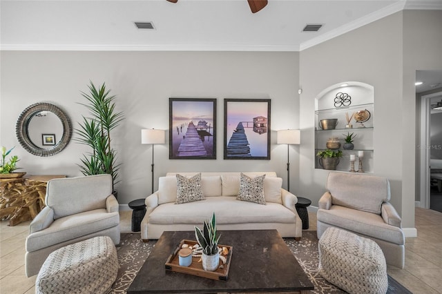 living area with crown molding, ceiling fan, visible vents, and tile patterned floors