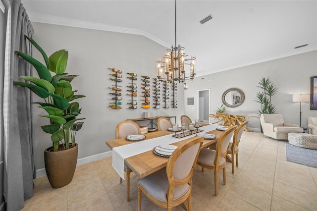 dining room with light tile patterned floors, lofted ceiling, visible vents, and crown molding