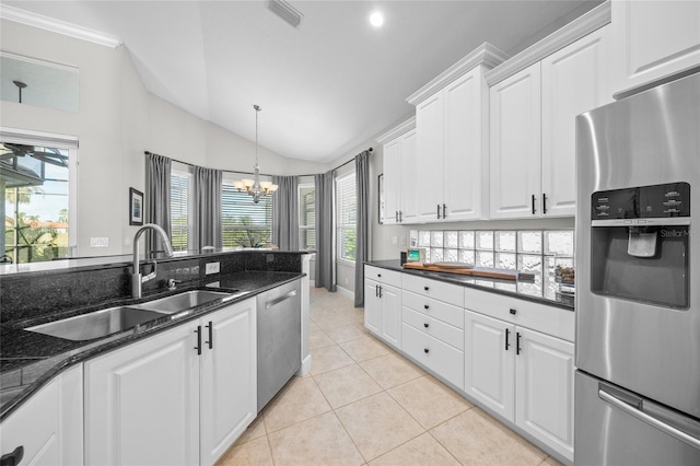 kitchen with visible vents, appliances with stainless steel finishes, white cabinetry, a sink, and light tile patterned flooring