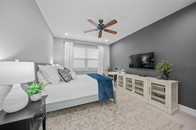 bedroom with a ceiling fan, recessed lighting, and baseboards