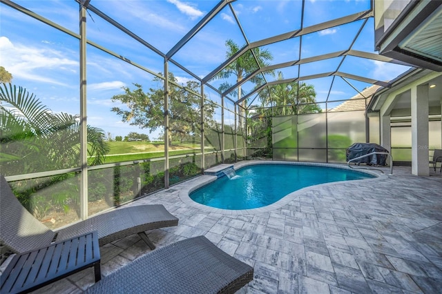 outdoor pool with glass enclosure and a patio