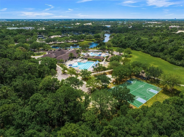 bird's eye view with a water view and a view of trees