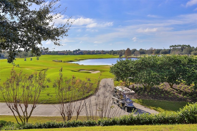 surrounding community featuring a water view and golf course view