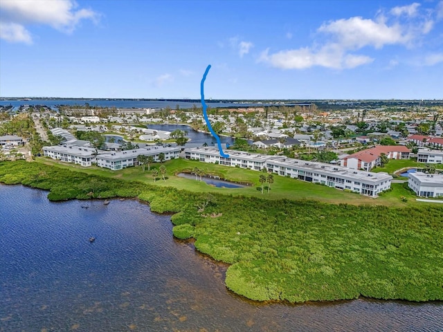 bird's eye view with a water view