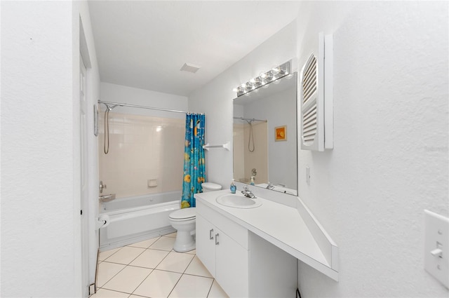 full bathroom featuring tile patterned flooring, vanity, shower / bath combo with shower curtain, and toilet