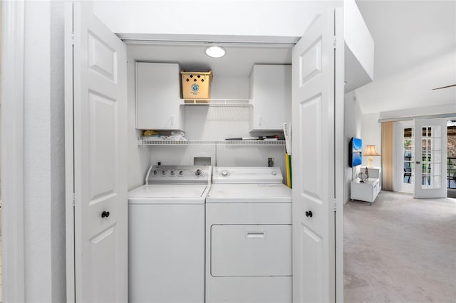 washroom featuring light carpet, french doors, and independent washer and dryer