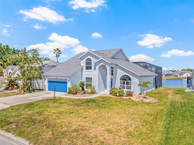 traditional home with a front yard, concrete driveway, roof with shingles, stucco siding, and an attached garage