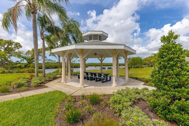 surrounding community with a gazebo, a patio area, and a yard