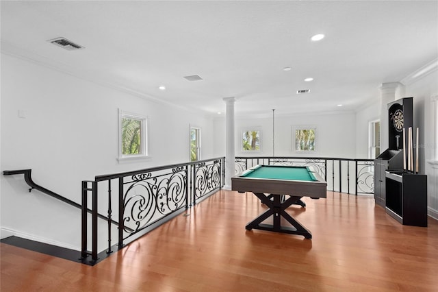 recreation room featuring ornate columns, crown molding, billiards, and hardwood / wood-style flooring