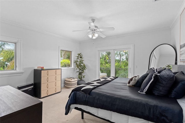 bedroom featuring ceiling fan, light colored carpet, ornamental molding, and multiple windows