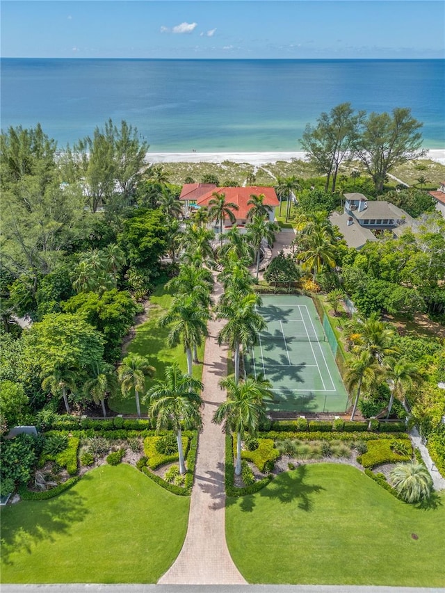 bird's eye view featuring a beach view and a water view