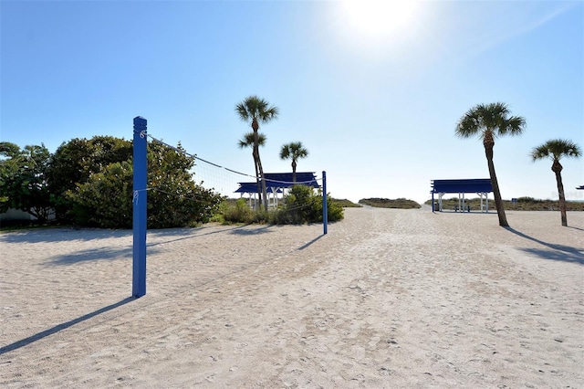 view of property's community featuring volleyball court