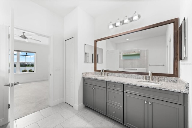 bathroom featuring vanity, tile patterned floors, and ceiling fan