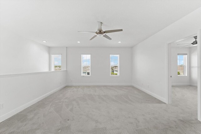 4704 Foxtail Dr, Parrish, FL 34219 - carpeted spare room with a ceiling fan, plenty of natural light, baseboards, and recessed lighting