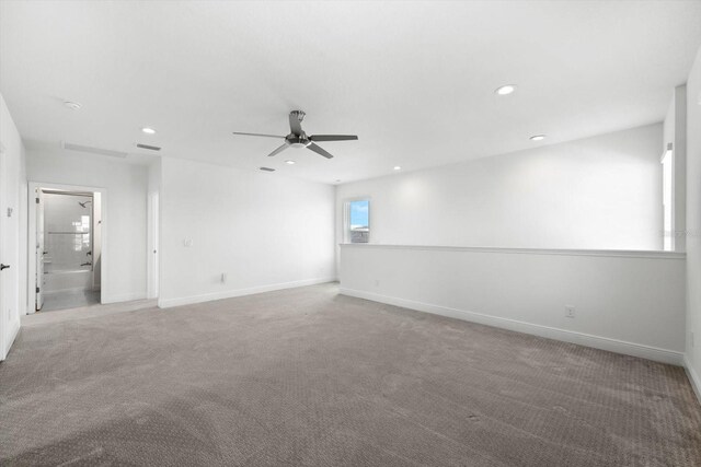 4704 Foxtail Dr, Parrish, FL 34219 - empty room with a ceiling fan, carpet floors, baseboards, and recessed lighting