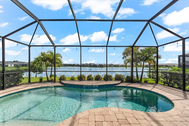 view of swimming pool with a patio, a water view, and a lanai