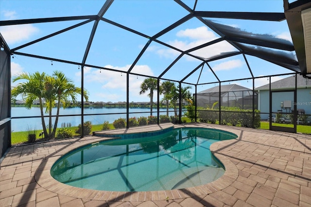 view of swimming pool featuring a lanai, a water view, and a patio