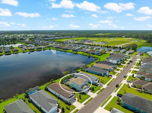 4704 Foxtail Dr, Parrish, FL 34219 - aerial view of residential area with a nearby body of water