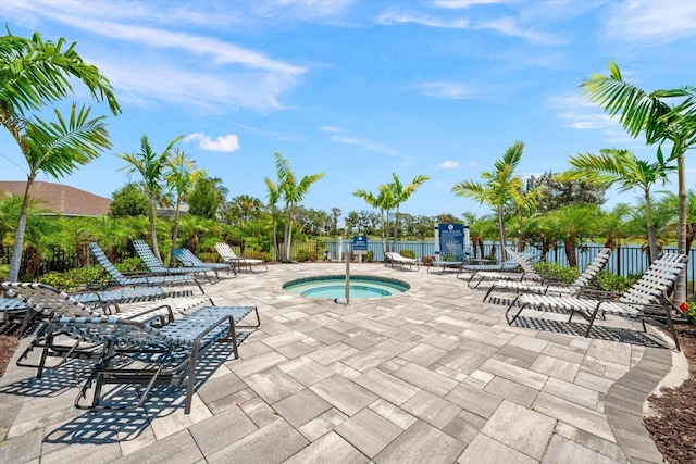 4704 Foxtail Dr, Parrish, FL 34219 - view of swimming pool featuring fence, a community hot tub, and a patio area
