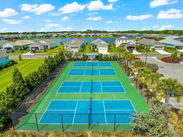 4704 Foxtail Dr, Parrish, FL 34219 - view of tennis court with fence and a residential view