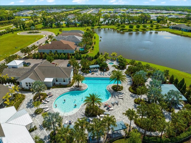 4704 Foxtail Dr, Parrish, FL 34219 - aerial perspective of suburban area with a pool area and a nearby body of water