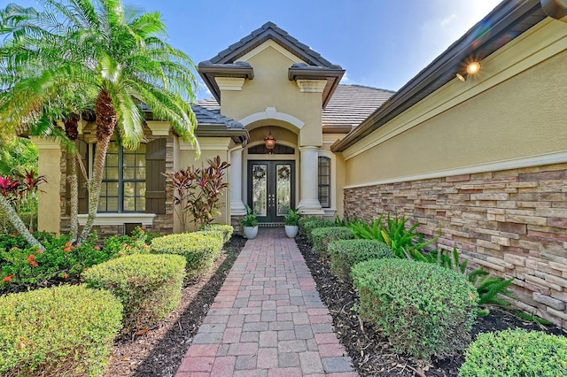 entrance to property featuring french doors