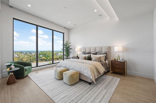 bedroom with light hardwood / wood-style flooring