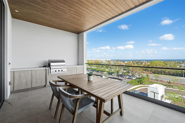 balcony featuring area for grilling