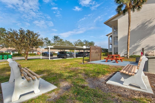 view of yard with a carport