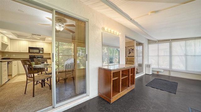 sunroom featuring a sink