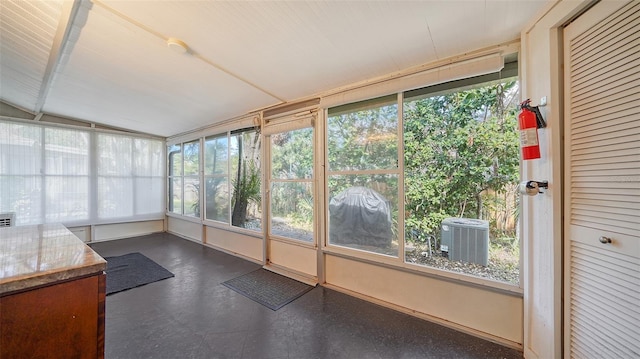 unfurnished sunroom with vaulted ceiling