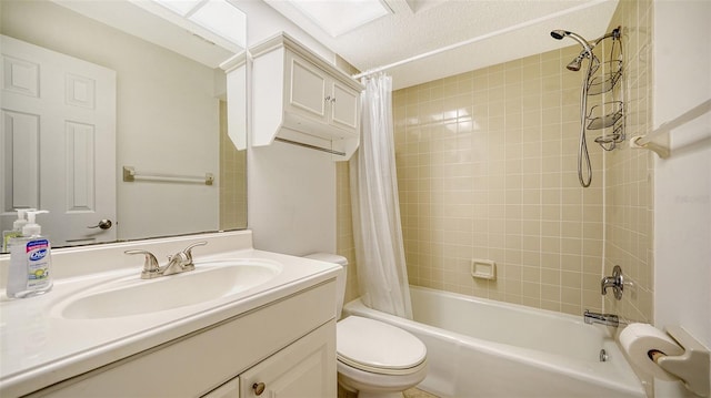 full bathroom featuring toilet, shower / bath combo, and vanity