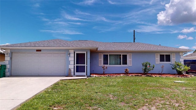 ranch-style house with a garage and a front yard