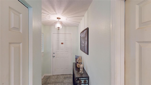 entryway with light tile patterned floors