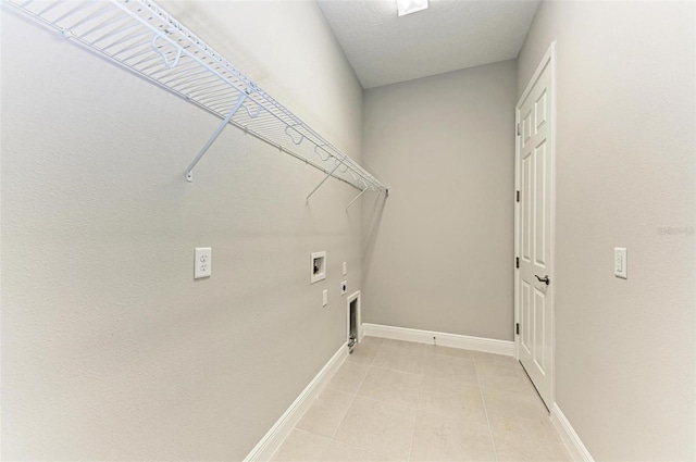 laundry room featuring light tile patterned floors, washer hookup, hookup for a gas dryer, and hookup for an electric dryer