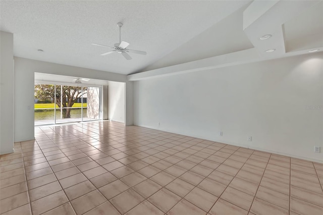 unfurnished room featuring ceiling fan, light tile patterned flooring, a textured ceiling, and high vaulted ceiling